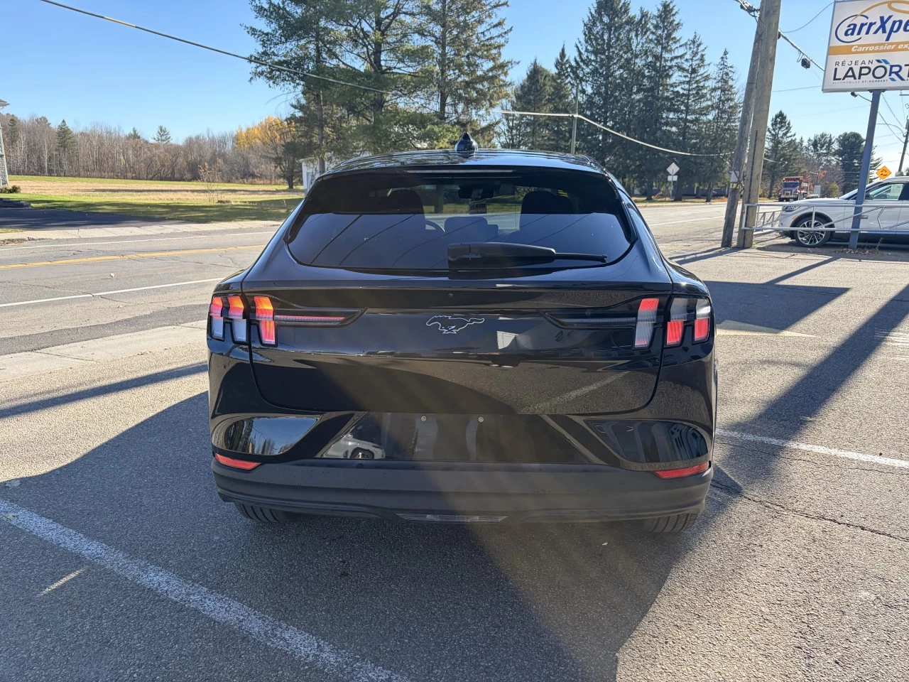 2025 Ford Mustang Mach-E SELECT TAPIS RECHARGE SANS FIL SIÈGES AVANT CHAUFFANT https://www.st-norbertford.com/resize/b990ff35b810a3abc0cc817b2ca24889-1