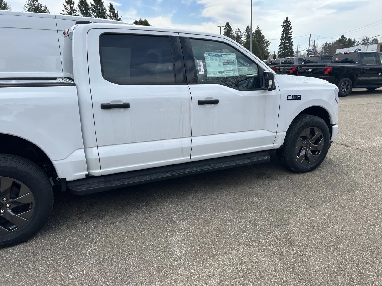 2024 Ford F-150 Lightning XLT 4x4 https://www.st-norbertford.com/resize/b990ff35b810a3abc0cc817b2ca24889-1