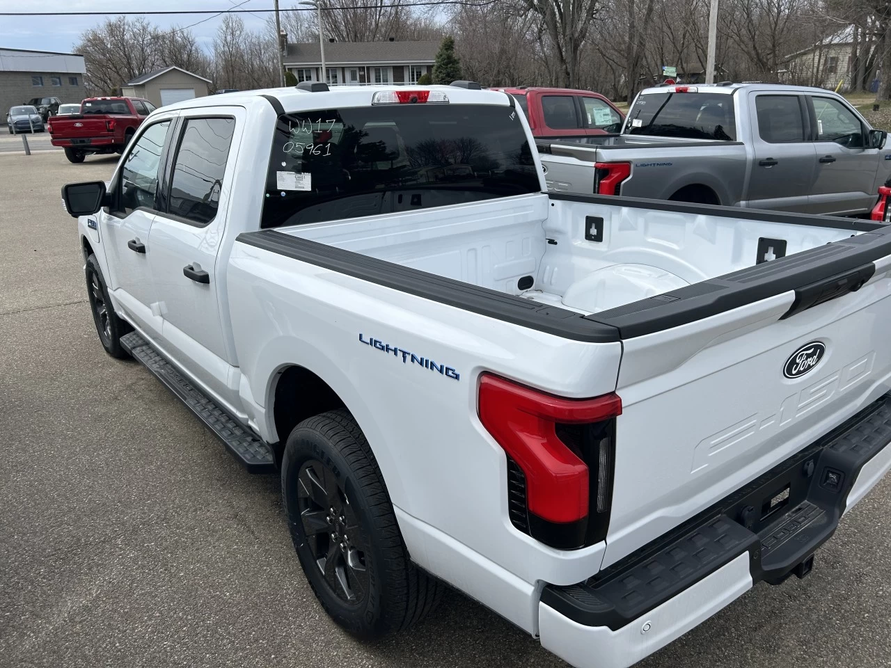 2024 Ford F-150 Lightning XLT 4x4 https://www.st-norbertford.com/resize/b990ff35b810a3abc0cc817b2ca24889-1