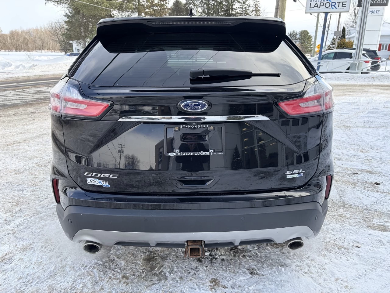 2019 Ford Edge SEL https://www.st-norbertford.com/resize/b990ff35b810a3abc0cc817b2ca24889-1