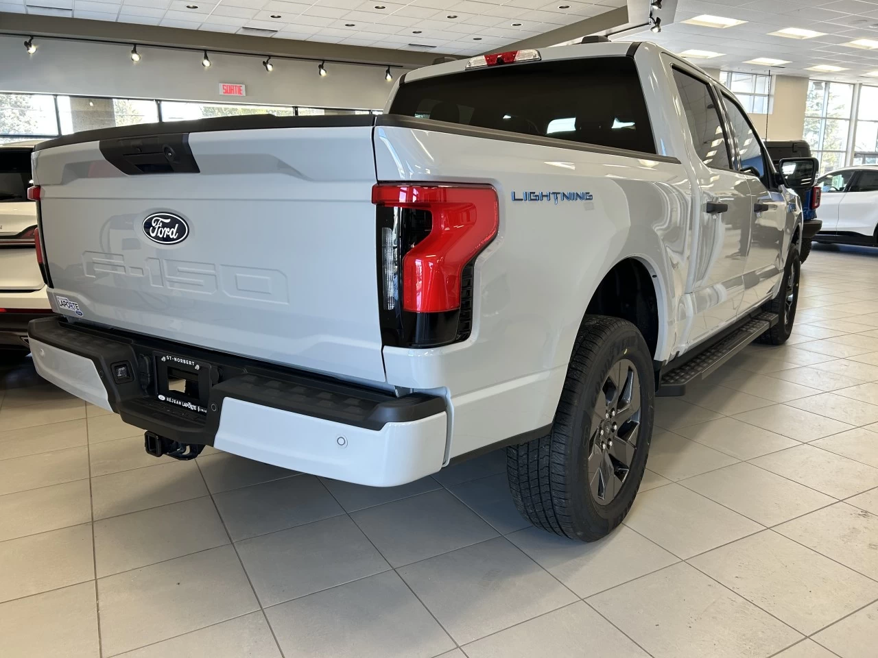 2024 Ford F-150 Lightning XLT https://www.st-norbertford.com/resize/b990ff35b810a3abc0cc817b2ca24889-1