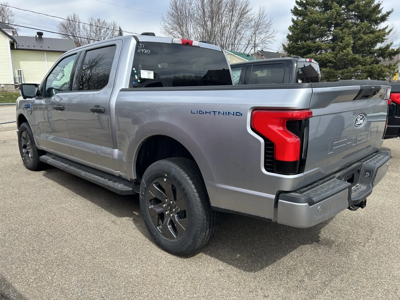 2024 Ford F-150 Lightning XLT 4x4 https://www.st-norbertford.com/resize/b990ff35b810a3abc0cc817b2ca24889-1