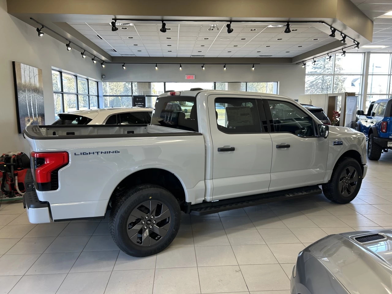 2024 Ford F-150 Lightning XLT https://www.st-norbertford.com/resize/b990ff35b810a3abc0cc817b2ca24889-1
